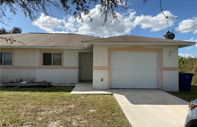 312 Poplar ST - 312 Poplar St, Lehigh Acres, FL 33974