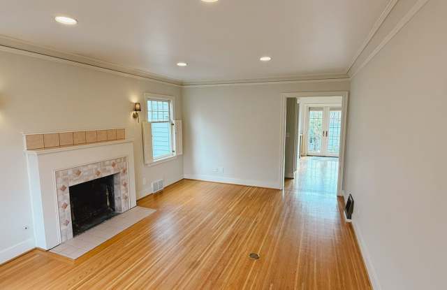 STEPS to Green Lake! 3BR Tudor Home w/ Landscaping Included!