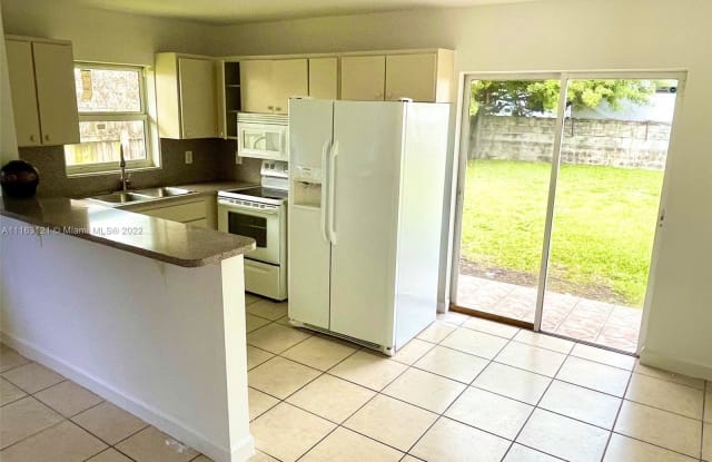 3177 NW 53rd St - 3177 NW 53rd St, Brownsville, FL 33142