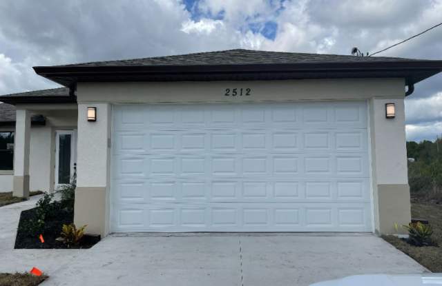 2512 13th St SW - 2512 13th Street Southwest, Lehigh Acres, FL 33976