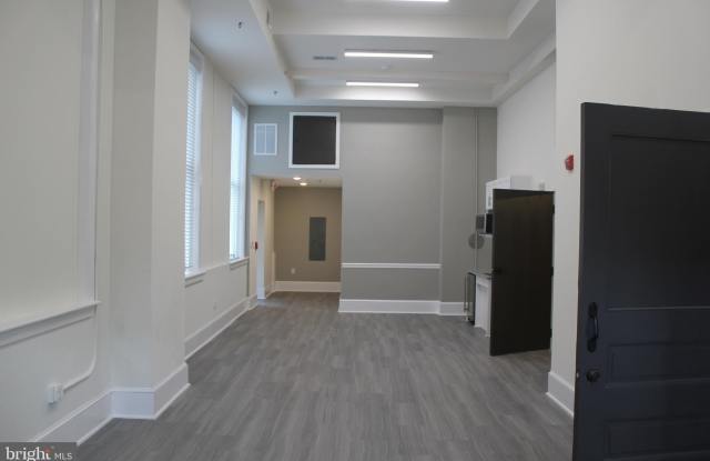 114 W COURT Street