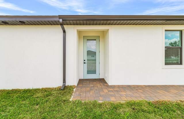 Stunning Brand New Construction Duplex with Canal View