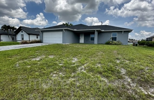 1011 NW 7th Pl - 1011 Northwest 7th Place, Cape Coral, FL 33993