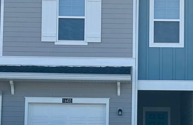 Photo of Stunning New 3-Bedroom, 2-Bath Townhome with Garage and Lanai