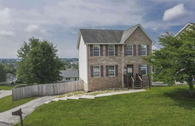 Spacious Home with Beautiful Sunroom & Lawn Care Included