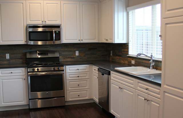 Gated 3 bdrm 2.5 bath Townhome with attached 1 car garage