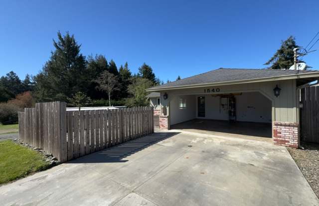 Newley updated 3-bedroom home features fenced yard, garage, and covered patios!