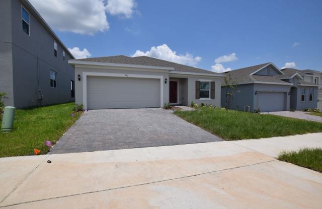 Photo of Newer home 4 bedroom 3 bath, 2 car Garage House for rent at 471 Ironside Trail Dr, Groveland, FL 34836,