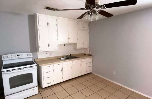 Adorable Remodeled three bedroom, one bath home with spacious fenced in back yard!!