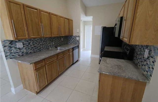 815 NE 213th Ter - 815 Northeast 213th Terrace, Ives Estates, FL 33179