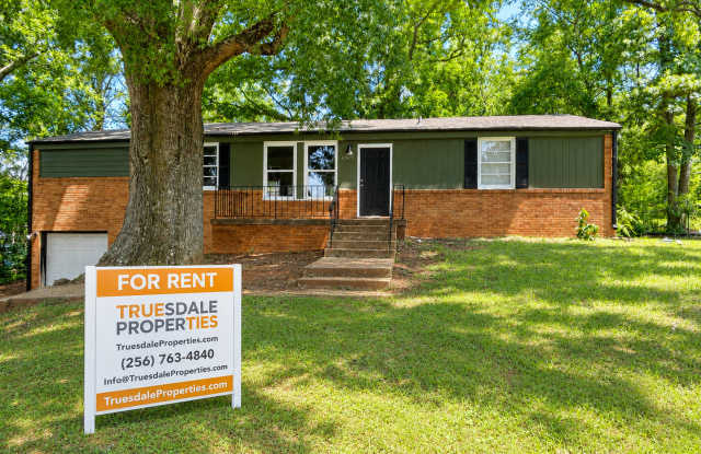 4br 1.5 Bath brick home with garage.