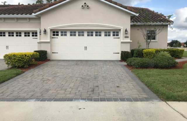 Charming 2-Story End Unit Townhouse in a Gated Community.