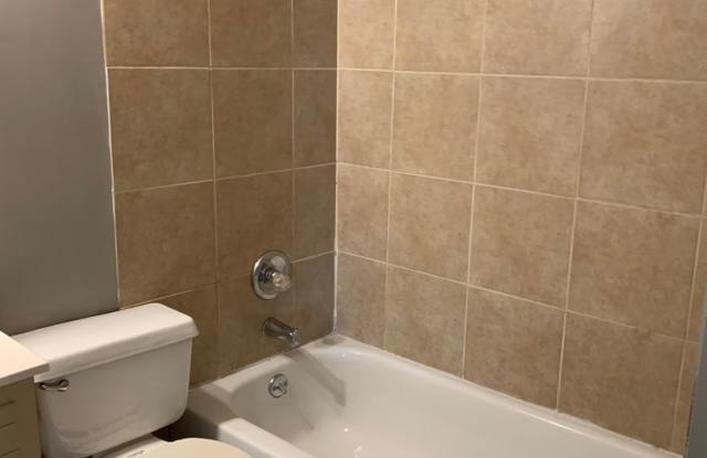 2 bedroom 1 bathroom duplex with a Carport