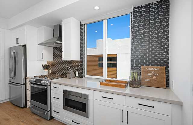 Photo of Modern Townhome FOR RENT in Golden Hill 3 Bed w/ 2 car garage!