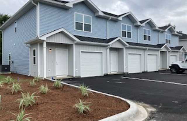 Photo of Brand New Built- 3 Bedroom 2.5 bath townhome.