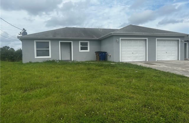 208-210 Homer Avenue S - 208 Homer Avenue South, Lehigh Acres, FL 33973