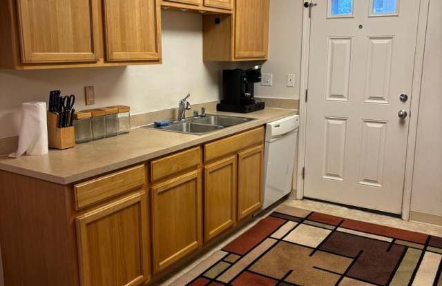 Photo of Move-In Ready 2BR/2BA Condo – Fully Furnished, AC, Washer/Dryer, Parking