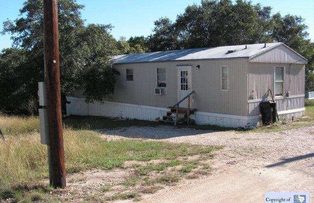 JUST LOWERED !! - 581 Buck Trail, Canyon Lake, TX 78133