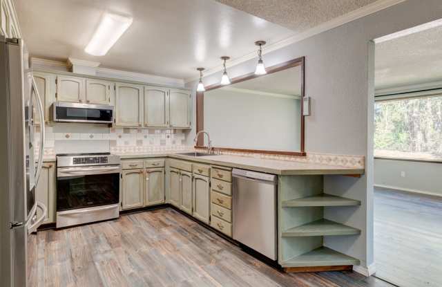 Spacious 4-Bedroom Home with Fireplace, Fenced Yard, and 2-Car Garage