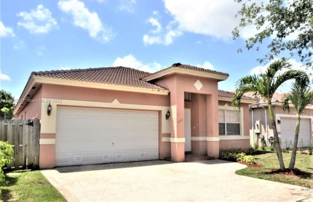 8980 NW 149th Ter - 8980 Northwest 149th Terrace, Miami Lakes, FL 33018