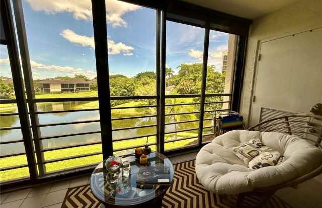 Photo of 7582 NE Regency Lake Dr