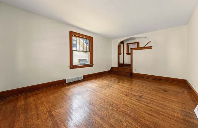 Classic Goodyear Heights Colonial — Hardwood, Arched Dining, Garage + Big Basement