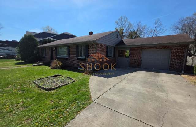 LARGER RANCH HOME WITH BASEMENT AND FENCED BACKYARD