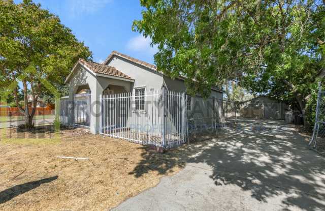 Photo of Looking for a charming 2-bedroom, 1-bath single-family home with a spacious yard?