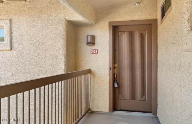 9100 E RAINTREE Drive