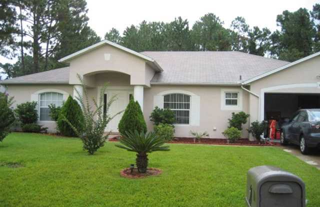 Photo of Beautiful 3/2/2 house with laminate floors, tiles, screen porch... First month rent 50% off