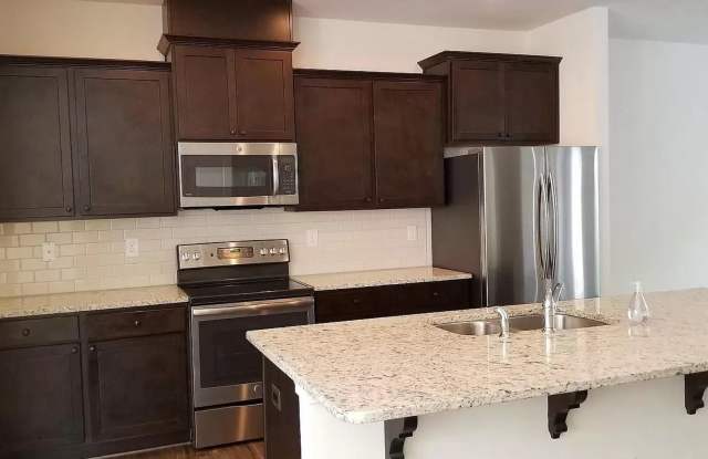 Photo of Room in 4 Bedroom Home at Sharonbrook Dr