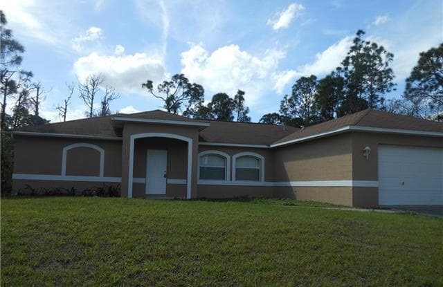 724 Alamo ST E - 724 Alamo Street East, Lehigh Acres, FL 33974