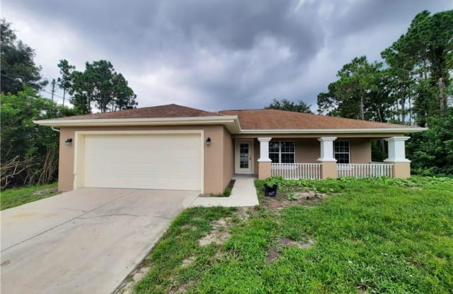 538 Flamingo Ave - 538 Flamingo Avenue, Lehigh Acres, FL 33974