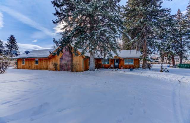 Large 4 bed, 2 bath single level house located minutes from Butte on 4 acres