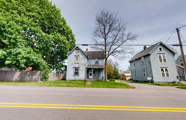 Freshly updated, large garage/small yard