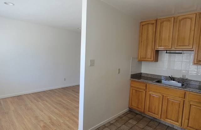 Clean, quiet 2 bedroom, and end unit, with lots of Natural Light in the Living Room and Kitchen area-MOVE IN SPECIAL*