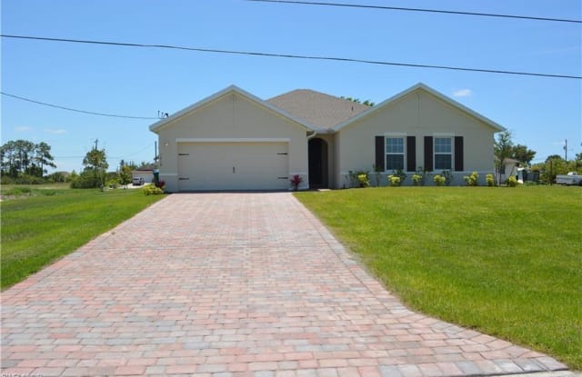 1618 NW 3rd ST - 1618 Northwest 3rd Place, Cape Coral, FL 33993