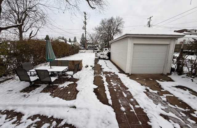 3 Bedroom 2 1/2 Bathroom with one car detached garage