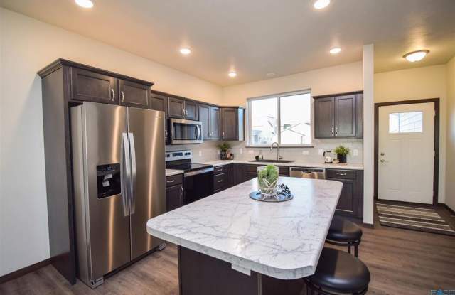 Modern Twin Home with Walk-Out Basement  Oversized Garage!