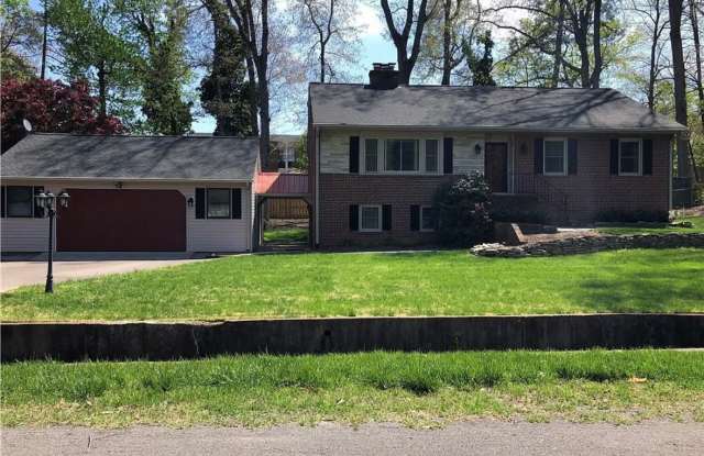 Beautifully Renovated 4bdrm/2.5bth Tri-Level Home Located on a Large Lot in Henrico County!!