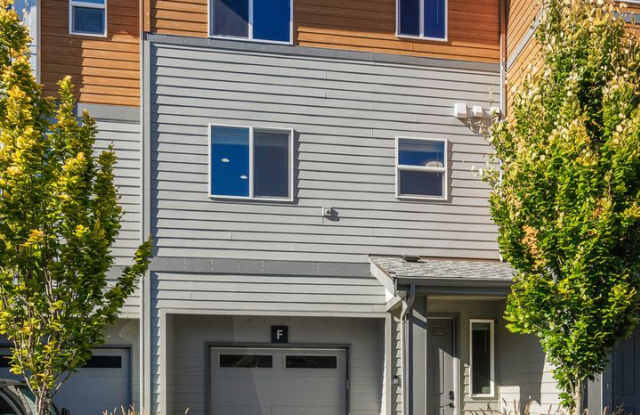 Modern Northshore Townhome with Designer Finishes & 2-Car Garage
