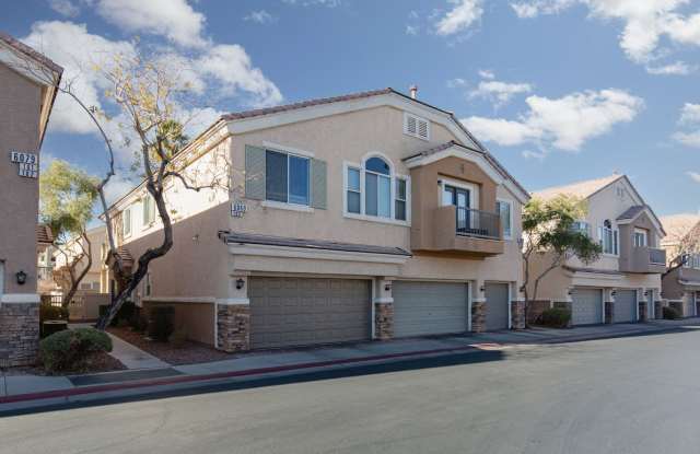 3 bedroom townhome with 2 car garage and a yard