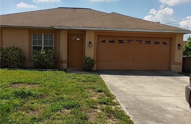 543 Pachman Circle - 543 Pachman Circle, Lehigh Acres, FL 33974