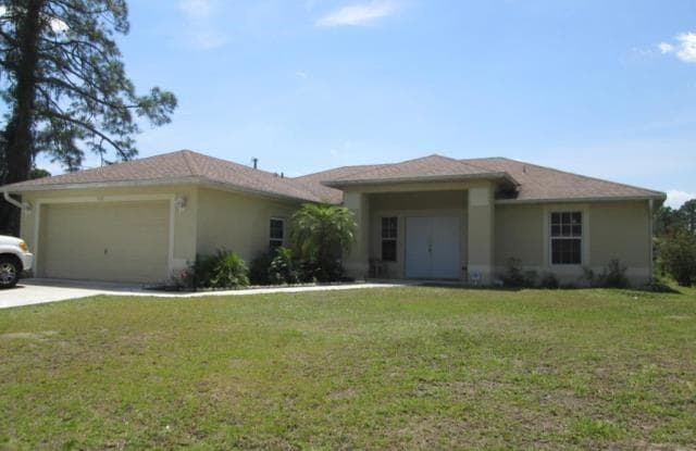 703 W 7th ST - 703 West 7th Street, Lehigh Acres, FL 33972