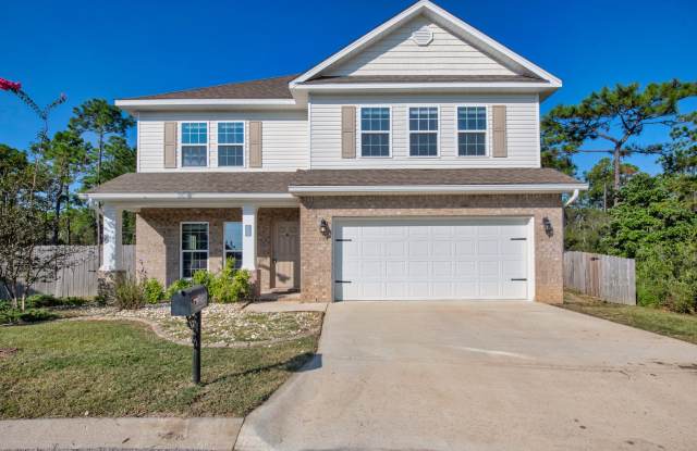 Spacious 4-Bedroom Home with Fenced Backyard in Pensacola!