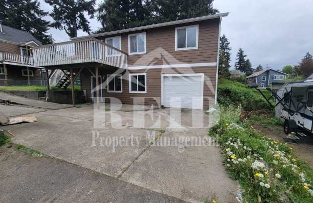 Centrally Located Bremerton Home With Partial View of Sinclair Inlet from Deck