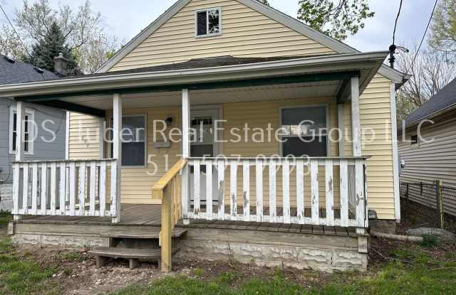 Lovely three bedroom, one bath home with brand new beautiful hardwood floors - a must see! - 1804 Ada Street, Lansing, MI 48910