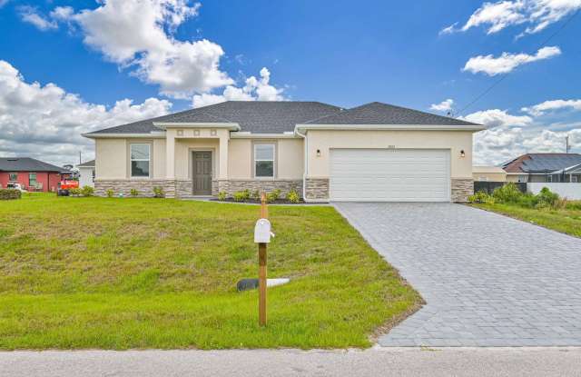 * 3 + Den Home in NW Cape ~ Brand New ~ High End Finishes * - 2832 Northwest 21st Place, Cape Coral, FL 33993