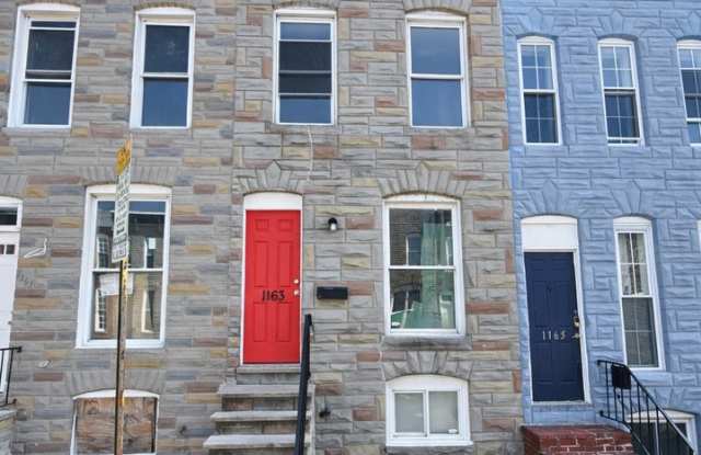 Charming Baltimore Rowhome with Private Backyard & Modern Updates