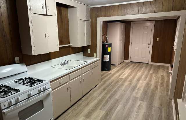 Available Now! 3-Bed, 1-Bath Central Springdale Home with Fenced-In Yard